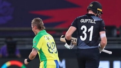 Australia's Adam Zampa celebrates the dismissal of New Zealand's Martin Guptill, right, during the Cricket Twenty20 World Cup final match between New Zealand and Australia in Dubai, UAE, Sunday, Nov. 14, 2021. (AP Photo/Aijaz Rahi) (AP) Australia's Adam Zampa celebrates the dismissal of New Zealand's Martin Guptill, right, during the Cricket Twenty20 World Cup final match between New Zealand and Australia in Dubai, UAE, Sunday, Nov. 14, 2021. (AP Photo/Aijaz Rahi) (AP)