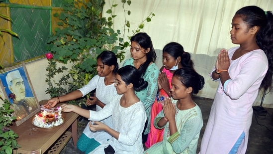 Young girls at Naba-Prabhat Orphanage, Tezpur pay tribute to India's first Prime Minister Jawaharlal Nehru on his 132nd birth anniversary which is celebrated in India on November 14 every year. (ANI)