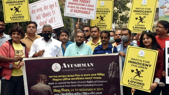 Members of 'Ayushman NGO' holding placards stage a rally for Child Rights on the occasion of Children's Day, in Kolkata.(ANI)