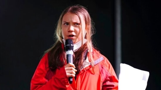 Climate activist Greta Thunberg speaks on the stage after a protest during the COP26 summit in Glasgow, Scotland.&nbsp;(Jane Barlow / AP)