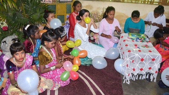 Children's Day was celebrated on November 20 till 1959. After the death of Jawaharlal Nehru, it was unanimously decided to celebrate it on November 14. Here are a few pictures of how the country is celebrating the occasion. In this photo, children at Naba-Prabhat Orphanage, Tezpur deck up and blow balloons to celebrate the occasion.(PTI)