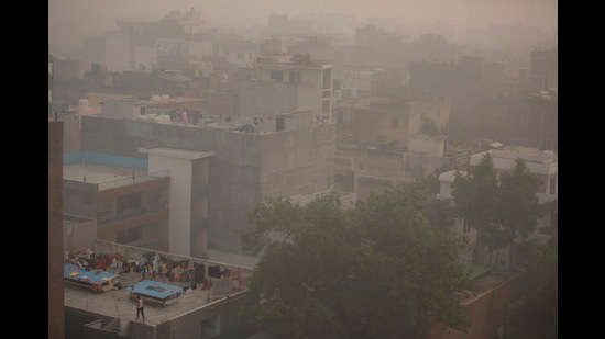 Morning haze and smog envelops the skyline in New Delhi on Friday. (AP)