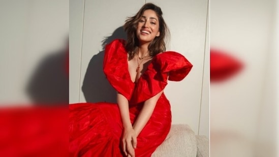 Yami Gautam turned muse for designer Malie in a red dress made from crisp silk taffeta.(Instagram/@yamigautam)