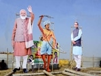 Cutouts of PM Modi, tribal leader Birsa Munda and Madhya Pradesh chief minister Shivraj Singh Chouhan are seen at Jambori Maidan in Bhopal.&nbsp;(PTI Photo)