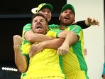 David Warner, Steve Smith and Aaron Finch after Australia scored the winning runs. (Getty) David Warner, Steve Smith and Aaron Finch after Australia scored the winning runs. (Getty)
