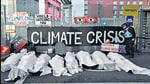 People protest against the climate crisis outside the venue of COP26 in Glasgow on November 11. (Reuters) People protest against the climate crisis outside the venue of COP26 in Glasgow on November 11. (Reuters)