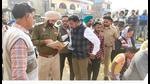Police investigating the firing episode at Chogawan village in Amritsar district’s Ajnala sub-division on Monday. Police investigating the firing episode at Chogawan village in Amritsar district’s Ajnala sub-division on Monday.