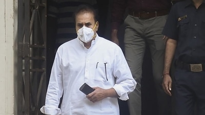Former Maharashtra home minister Anil Deshmukh being taken to special court for remand by ED officials in Mumbai. (PTI)