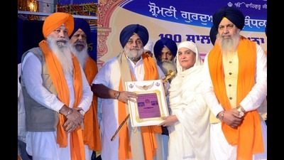Akali Dal president Sukhbir Singh Badala being honoured by SGPC chief Jagir Kaur at the Golden Temple in Amritsar. Akali Dal president Sukhbir Singh Badala being honoured by SGPC chief Jagir Kaur at the Golden Temple in Amritsar.