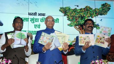 Jharkhand Governor Ramesh Bais, Chief Minister Hemant Soren and Rural Development Minister Alamgir Alam release a souvenir on the birth anniversary of tribal leader Birsa Munda and the foundation day of Jharkhand State, in Ranchi, Monday. (PTI) Jharkhand Governor Ramesh Bais, Chief Minister Hemant Soren and Rural Development Minister Alamgir Alam release a souvenir on the birth anniversary of tribal leader Birsa Munda and the foundation day of Jharkhand State, in Ranchi, Monday. (PTI)