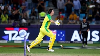 Australia's highest scorer with 77 runs Mitchell Marsh drops his bat as he celebrates after his teammate Glenn Maxwell hit a four to win the tournament in the Cricket Twenty20 World Cup final match between Australia and New Zealand in Dubai, UAE, Sunday, Nov. 14, 2021. Australia won by 8 wickets. (AP) Australia's highest scorer with 77 runs Mitchell Marsh drops his bat as he celebrates after his teammate Glenn Maxwell hit a four to win the tournament in the Cricket Twenty20 World Cup final match between Australia and New Zealand in Dubai, UAE, Sunday, Nov. 14, 2021. Australia won by 8 wickets. (AP)