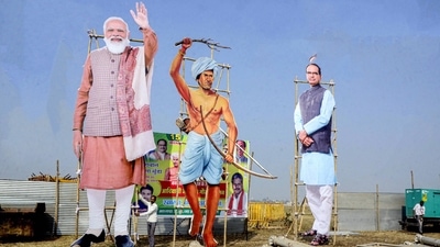 Huge cutouts of Prime Minister Narendra Modi, Tribal leader Birsa Munda and Madhya Pradesh Chief Minister Shivraj Singh Chouhan were displayed on the streets for Tribal Pride Day celebration ahead of PM Modi's visit at Jamboree ground, in Bhopal. (PTI) Huge cutouts of Prime Minister Narendra Modi, Tribal leader Birsa Munda and Madhya Pradesh Chief Minister Shivraj Singh Chouhan were displayed on the streets for Tribal Pride Day celebration ahead of PM Modi's visit at Jamboree ground, in Bhopal. (PTI)