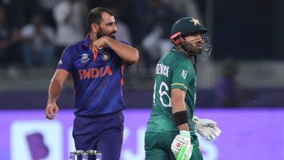 India's Mohammed Shami reacts after Pakistan's Mohammad Rizwan hit consecutive boundaries in his last over of the match during the Cricket Twenty20 World Cup match between India and Pakistan in Dubai (AP) India's Mohammed Shami reacts after Pakistan's Mohammad Rizwan hit consecutive boundaries in his last over of the match during the Cricket Twenty20 World Cup match between India and Pakistan in Dubai (AP)