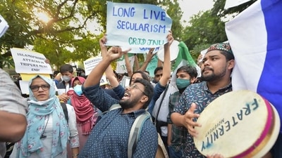 AISA members stage a protest against Tripura violence outside Tripura Bhawan, in New Delhi, on October 29. Two journalists, who were arrested for their reportage, were granted bail on Monday. (PTI) AISA members stage a protest against Tripura violence outside Tripura Bhawan, in New Delhi, on October 29. Two journalists, who were arrested for their reportage, were granted bail on Monday. (PTI)