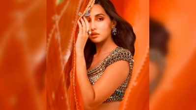 Nora Fatehi wrote lyrics of a Punjabi song as her caption on her Instagram post. "Palka tikhiyan tikhiyan.. Te faakhan nikkiyan nikkiyan.. Jado une mainu takeyan.. Mera pahad ke seena rakheya.. Chandan da lagdi vag pai.. Meri sutti qismat jaag pai.. Mai honsa sab bhula liya ," she wrote. (Instagram/@norafatehi) Nora Fatehi wrote lyrics of a Punjabi song as her caption on her Instagram post. "Palka tikhiyan tikhiyan.. Te faakhan nikkiyan nikkiyan.. Jado une mainu takeyan.. Mera pahad ke seena rakheya.. Chandan da lagdi vag pai.. Meri sutti qismat jaag pai.. Mai honsa sab bhula liya ," she wrote. (Instagram/@norafatehi)