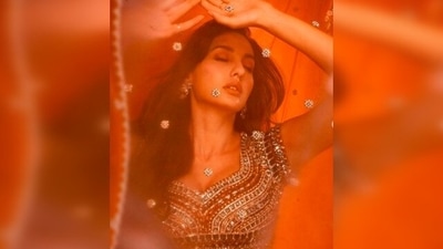 Nora Fatehi aced her recent photoshoot donning a stunning red lehenga set by Monisha Jaising. (Instagram/@norafatehi) Nora Fatehi aced her recent photoshoot donning a stunning red lehenga set by Monisha Jaising. (Instagram/@norafatehi)