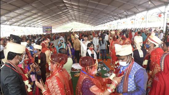 The mass marriage event was organised by the Uttar Pradesh government, in Ghaziabad on Monday. (Sakib Ali/HT) The mass marriage event was organised by the Uttar Pradesh government, in Ghaziabad on Monday. (Sakib Ali/HT)