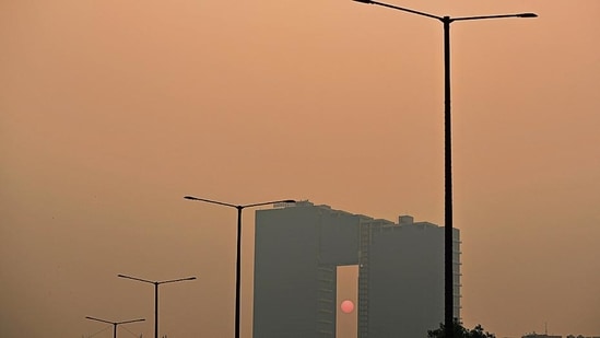 An office building shrouded in smog in Noida on Monday.&nbsp;(REUTERS)