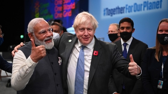 Prime Minister Narendra Modi and his British counterpart Boris Johnson attend the World Leaders' Summit on the sidelines of COP26 in Glasgow.&nbsp;(AP / File photo)