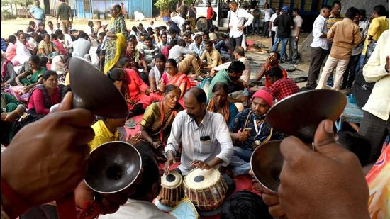 MSRTC employees stage a symbolic protest with traditional bhajans and kirtans during their ongoing strike at Azad Maidan, in Mumbai, on Monday. (Bhushan Koyande/HT PHOTO) MSRTC employees stage a symbolic protest with traditional bhajans and kirtans during their ongoing strike at Azad Maidan, in Mumbai, on Monday. (Bhushan Koyande/HT PHOTO)
