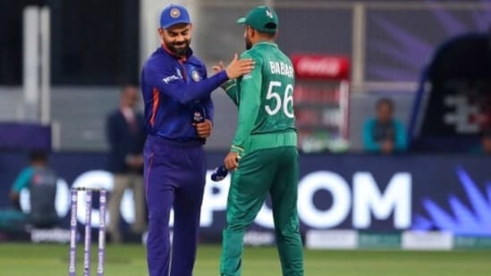 Former India T20I captain Virat Kohli greets Pakistan skipper Babar Azam in T20 World Cup 2021.(AP)