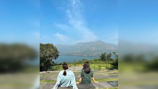 Sonakshi Sinha and Sanam Ratansi get lost in nature as they sit and enjoy the view of the beautiful Mulshi lake.(Instagram/@aslisona)