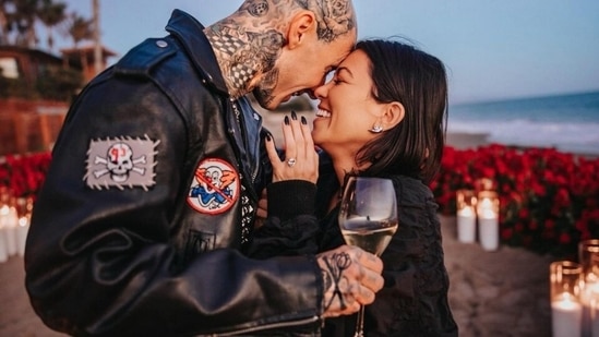 Kourtney Kardashian and Travis Barker Share Cute Moment in Art Gallery