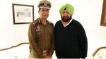 Dinkar Gupta with then chief minister Capt Amarinder Singh after his appointment as the Punjab Police chief in Chandigarh in 2019. (HT file photo) Dinkar Gupta with then chief minister Capt Amarinder Singh after his appointment as the Punjab Police chief in Chandigarh in 2019. (HT file photo)