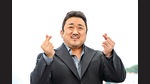 Don Lee makes the Korean ‘finger heart’ (Corbis via Getty Images) Don Lee makes the Korean ‘finger heart’ (Corbis via Getty Images)