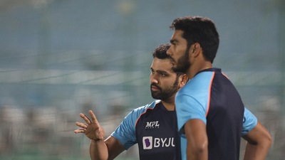 “So, Venkatesh Iyer, the thing is…”: Can you guess what Rohit Sharma might be saying here to the youngster. (BCCI/TWITTER)