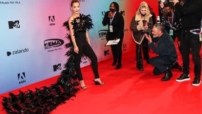 Rita Ora stuns at the European MTV Awards in black veil fur top and high-rise pants. (AP)
