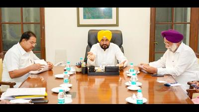 Punjab chief minister Charanjit Singh Channi chaired a cabinet meeting in Chandigarh on Tuesday. Earlier, he visited Dharowali, the ancestral village of deputy chief minister Sukhjinder Singh Randhawa (right) in Gurdaspur district. (HT file photo)