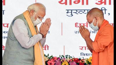 Prime Minister Narendra Modi and UP Chief Minister Yogi Adityanath exchange greetings during the inauguration of the Purvanchal Expressway, in Sultanpur, Tuesday, (PTI Photo) Prime Minister Narendra Modi and UP Chief Minister Yogi Adityanath exchange greetings during the inauguration of the Purvanchal Expressway, in Sultanpur, Tuesday, (PTI Photo)