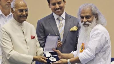 Indian President Ram Nath Kovind (left) confers the Best Male Playback Singer award to KJ Yesudas (right) during the 65th National Film Awards ceremony in New Delhi on May 3, 2018. (AP/File) Indian President Ram Nath Kovind (left) confers the Best Male Playback Singer award to KJ Yesudas (right) during the 65th National Film Awards ceremony in New Delhi on May 3, 2018. (AP/File)