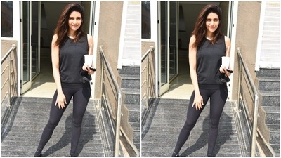 Karishma rounded off the post-workout look with side-swept open tresses, black Ivy Park slides, and a face mask. She flaunted her natural glow by going sans any make-up. What do you think about both their ensembles? (HT Photo/Varinder Chawla) Karishma rounded off the post-workout look with side-swept open tresses, black Ivy Park slides, and a face mask. She flaunted her natural glow by going sans any make-up. What do you think about both their ensembles? (HT Photo/Varinder Chawla)