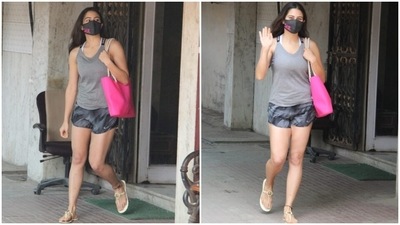 Sara chose a grey sleeveless racerback tank top for her gym day and teamed it with a pair of grey and black printed training shorts. She also wore a black fabric face mask, adorned with her embroidered initials 'SAK', to keep herself safe during the pandemic. (HT Photo/Varinder Chawla) Sara chose a grey sleeveless racerback tank top for her gym day and teamed it with a pair of grey and black printed training shorts. She also wore a black fabric face mask, adorned with her embroidered initials 'SAK', to keep herself safe during the pandemic. (HT Photo/Varinder Chawla)