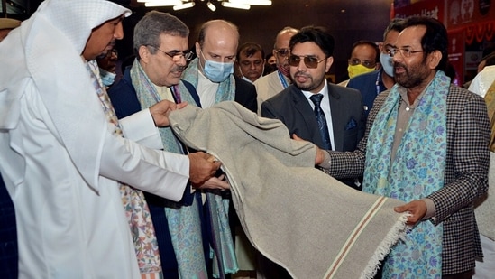 Union Minority Affairs Minister Mukhtar Abbas Naqvi with Iran Ambassador to India H.E. Dr. Ali Chegeni and Ambassador of Kuwait to India Jasem Ibrahem Al Najem attend the inauguration of the 33rd Hunar Haat at the 40th India International Trade Fair at Pragati Maidan in New Delhi.(ANI)