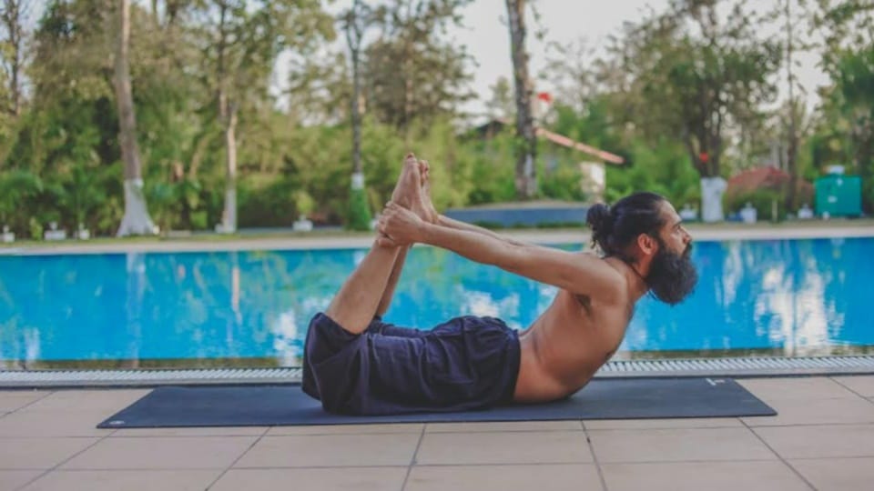 Dhanurasana or bow pose(Grand Master Akshar)