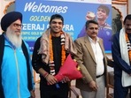 Olympic Gold medalist Javelin thrower Neeraj Chopra along with SAI NIS Senior Executive Director Colonel Raj Singh Bishnoi (2nd from right) and other dignitaries in a group picture during a felicitation ceremony, at NSNIS, in Patiala on Wednesday.(ANI) Olympic Gold medalist Javelin thrower Neeraj Chopra along with SAI NIS Senior Executive Director Colonel Raj Singh Bishnoi (2nd from right) and other dignitaries in a group picture during a felicitation ceremony, at NSNIS, in Patiala on Wednesday.(ANI)