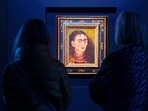 Visitors inspect Frida Kahlo's Visitors inspect Frida Kahlo's
