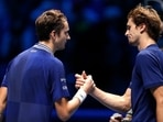 Russia's Daniil Medvedev with Germany's Alexander Zverev after their group stage match&nbsp;