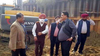 The under-construction railway under bridge (RUB) at the Pakhowal road railway crossing - from Pakhowal canal bridge towards Sarabha Nagar - had turned into a pool of filthy sewer water after the chamber of a main sewer line (72-inches wide) was damaged during the construction process in the last week of October (HT PHOTO)