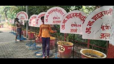 Indira Marathon booth markers being prepared at the Madam Mohan Malaviya Stadium, Prayagraj, on Wednesday. (HT Photo) Indira Marathon booth markers being prepared at the Madam Mohan Malaviya Stadium, Prayagraj, on Wednesday. (HT Photo)