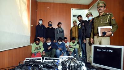 Police have recovered ten computers, one laptop, one printer, ten headphones, one internet router, four hard discs, 16 RAM, 99 letterhead pads and six mobile phones from the suspects. (Sunil Ghosh) Police have recovered ten computers, one laptop, one printer, ten headphones, one internet router, four hard discs, 16 RAM, 99 letterhead pads and six mobile phones from the suspects. (Sunil Ghosh)