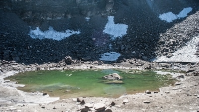 Roop Kund: Roop Kund is a glacial lake of Uttarakhand. Also known as the mystery lake, Roop Kund, is uninhabited and situated at an altitude of 5,020 m. It is surrounded with the skeletons of human beings - it is believed to be of the group of expeditioners who lost their lives in a landslide in the 90s. (Live Hindustan) Roop Kund: Roop Kund is a glacial lake of Uttarakhand. Also known as the mystery lake, Roop Kund, is uninhabited and situated at an altitude of 5,020 m. It is surrounded with the skeletons of human beings - it is believed to be of the group of expeditioners who lost their lives in a landslide in the 90s. (Live Hindustan)