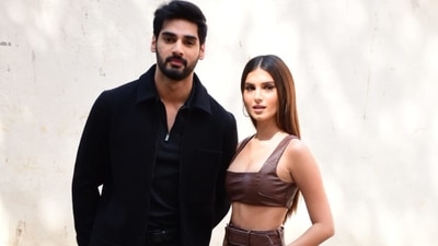 Actors Ahan Shetty and Tara Sutaria pose for paparazzi outside Mehboob Studio in Mumbai. (Varinder Chawla) 