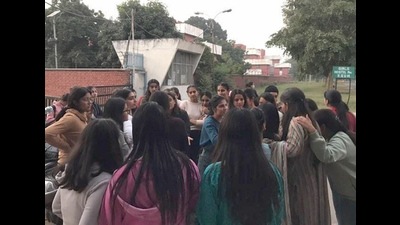 PAU students gathered outside girls’ hostel number 11 on Wednesday. (HT photo)