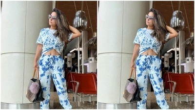 Hina decked up in a tie and dye white and blue top with a knot detail in the front. (Instagram/@realhinakhan) Hina decked up in a tie and dye white and blue top with a knot detail in the front. (Instagram/@realhinakhan)