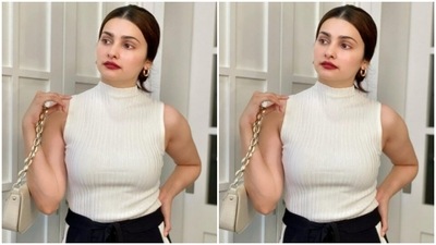 Prachi teamed a white top with a black pair of joggers. (Instagram/@prachidesai) Prachi teamed a white top with a black pair of joggers. (Instagram/@prachidesai)