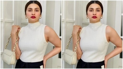 Prachi accessorised her look for the day with a sleek ivory white sling bag with gold chains. (Instagram/@prachidesai) Prachi accessorised her look for the day with a sleek ivory white sling bag with gold chains. (Instagram/@prachidesai)